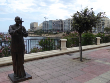 Sri Chinmoy statue on Sliema's promenade as symbol of peace. Malta